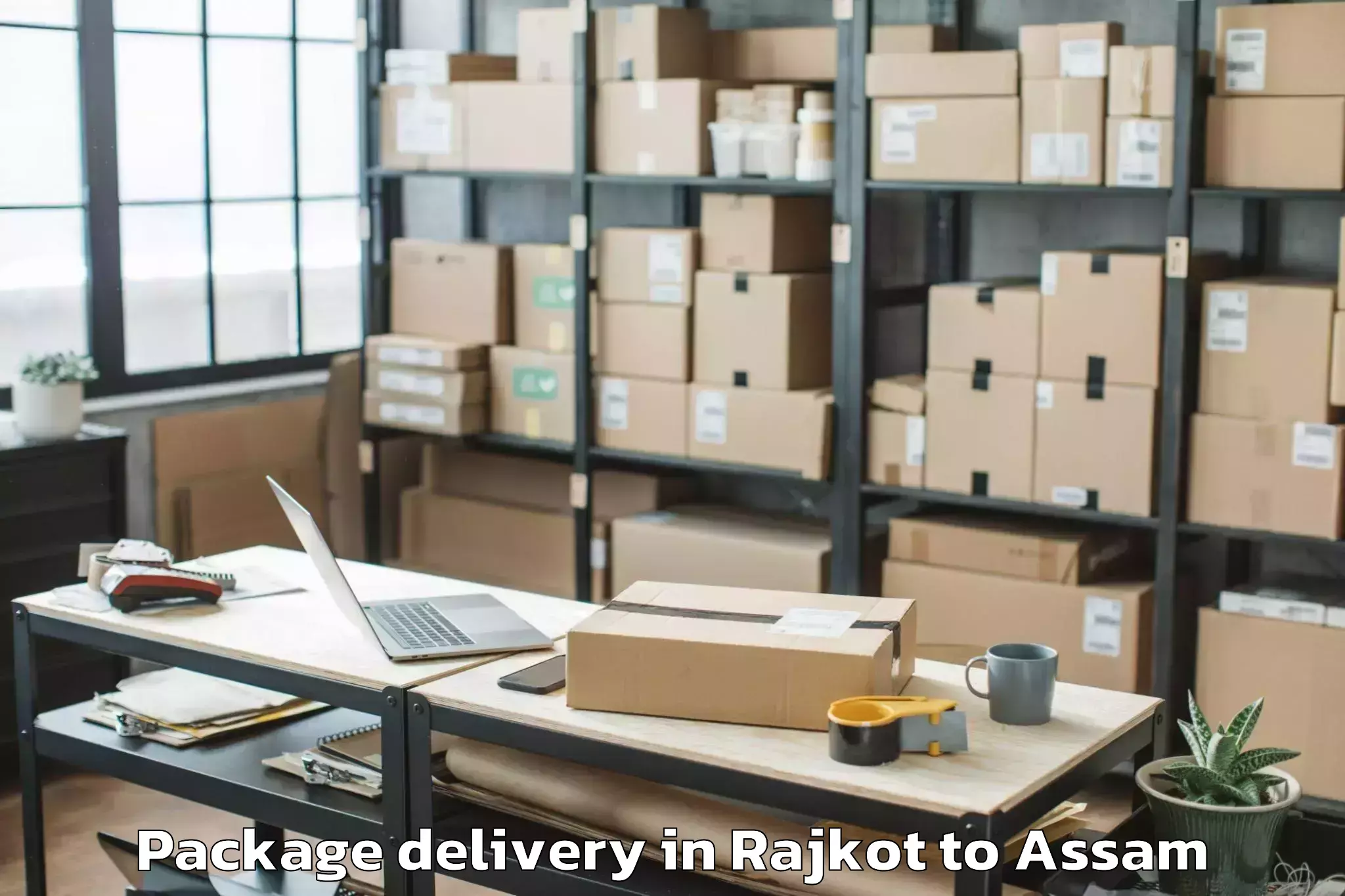 Quality Rajkot to Lakhipur Package Delivery